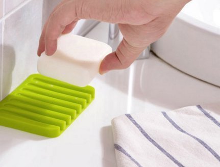 Flexible light gray silicone soap dish holder & saver tray with drainage slots for shower