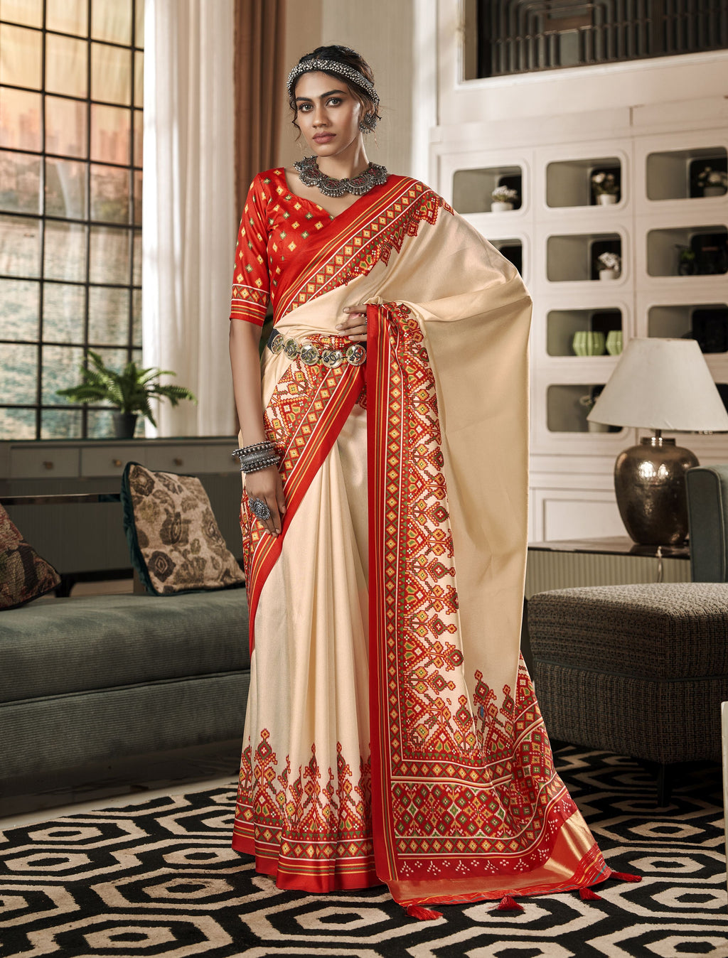 Off white saree with red royal Patola print
