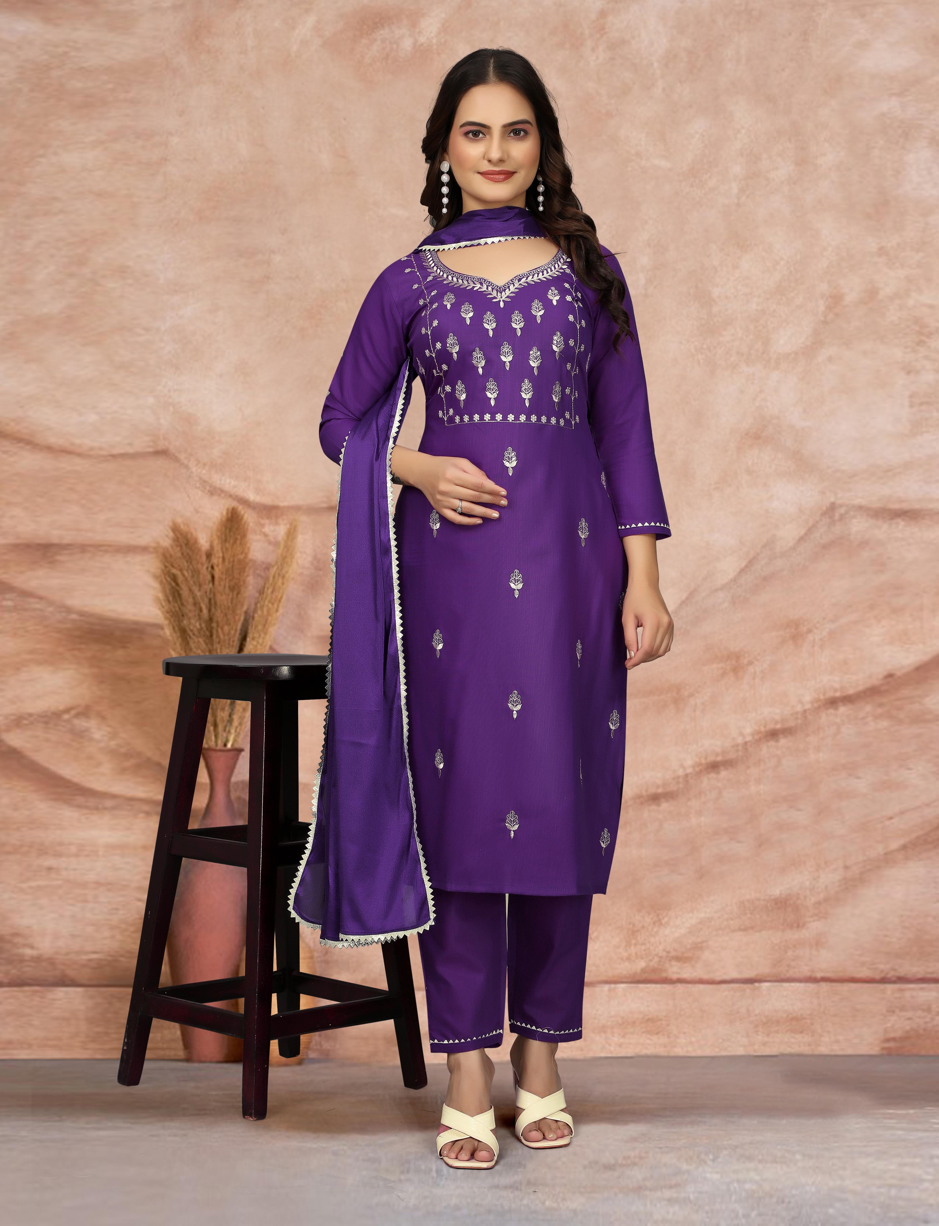Model in rich purple embroidered cotton blend kurti set with silk dupatta, elegant front view.
