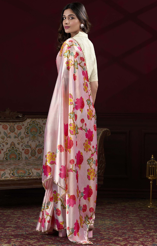 Peach Japan satin silk saree with digital floral print and elegant pearl lace border.