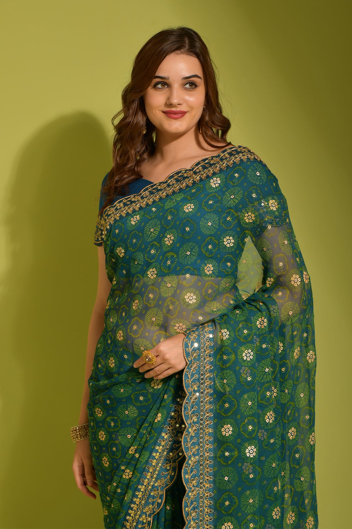 Exquisite petrol georgette chiffon saree with flower print, foil & sequin work