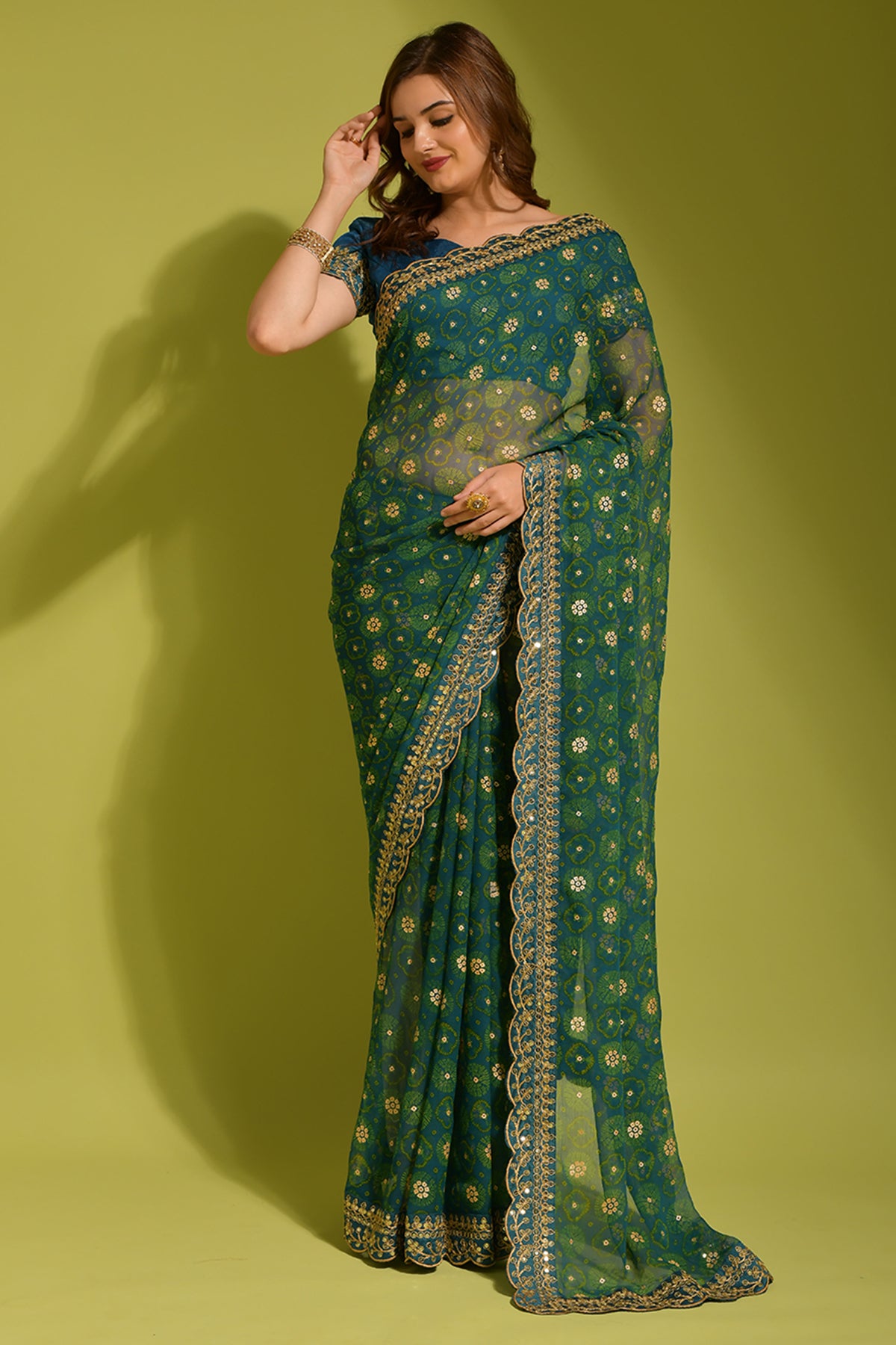 Exquisite petrol georgette chiffon saree with flower print, foil & sequin work