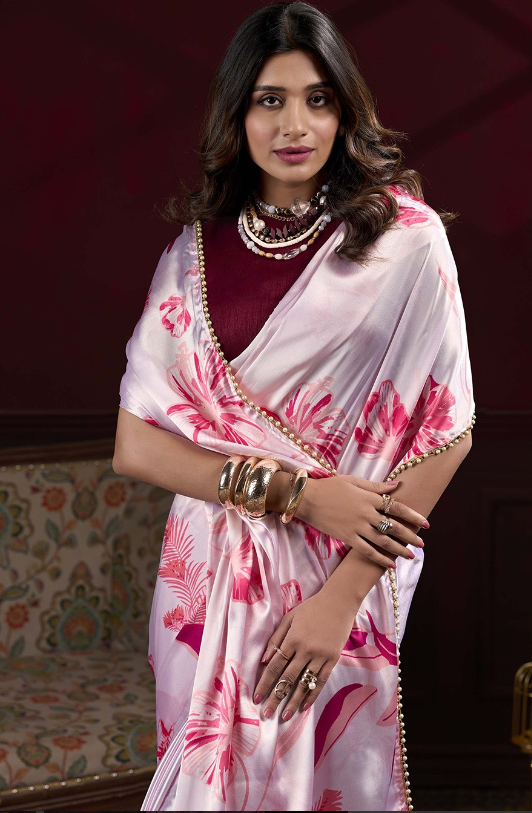 Pink Japan satin silk saree with digital floral print & elegant pearl lace border.