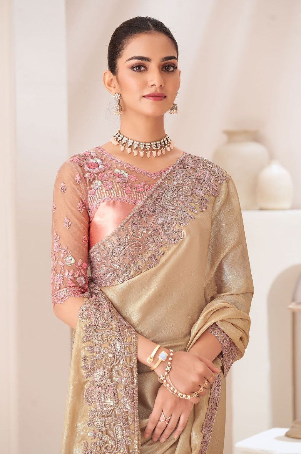 Close-up of the smooth, flowing satin chiffon fabric drape and the elegant sheen of the matching blouse material.