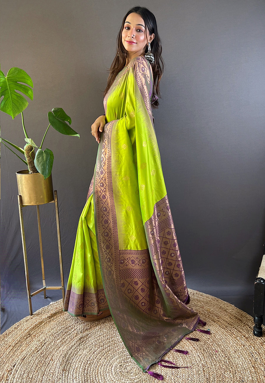 Pista green soft silk zari woven festival wear saree with intricate detailing