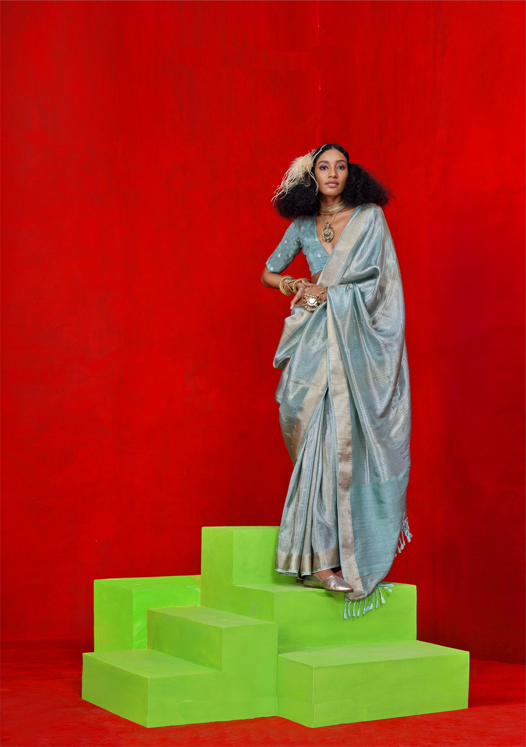 Pure Viscose Zari Tissue Saree, highlighting its unique sheen and intricate zari work.