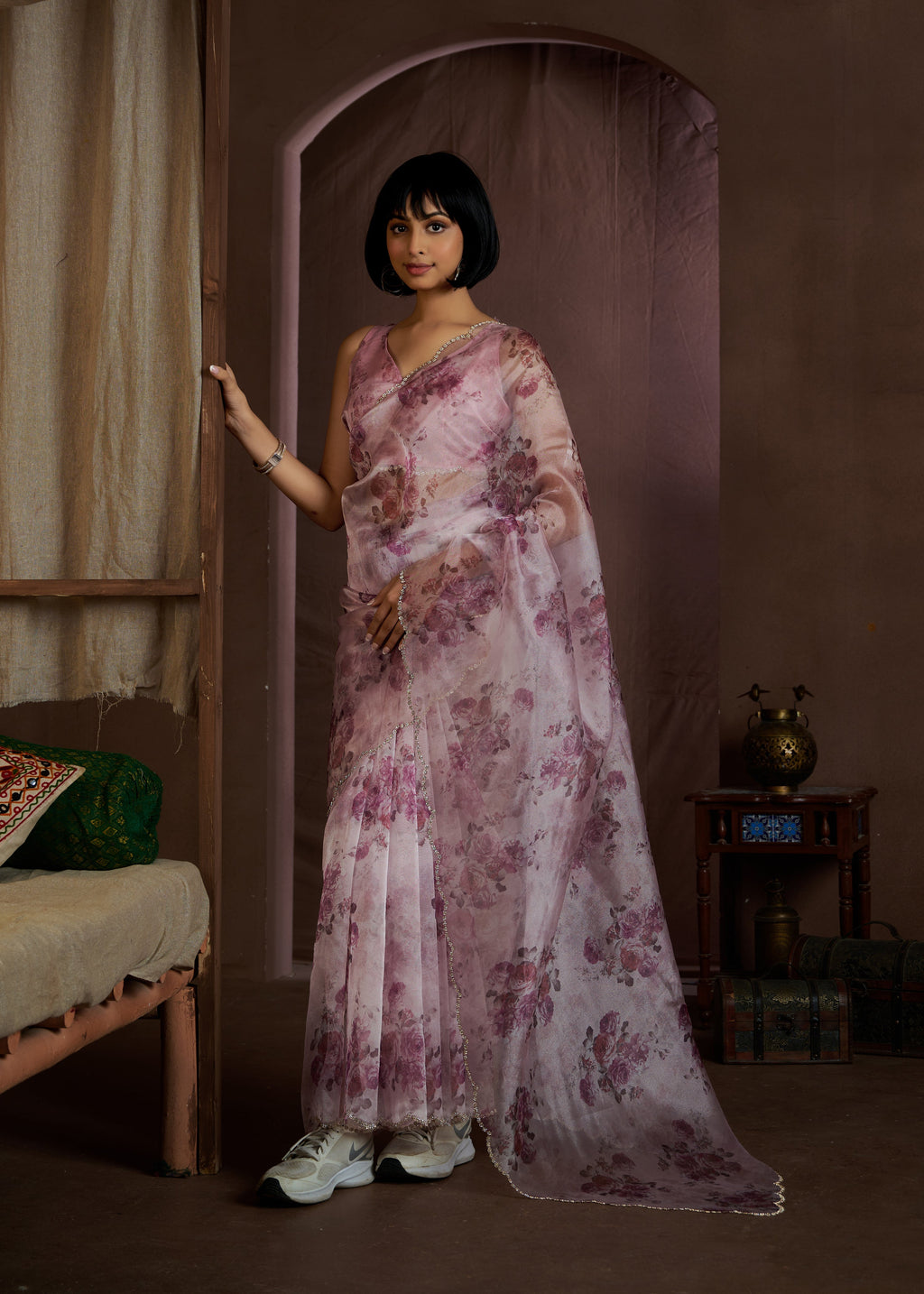 Purple organza saree with vibrant digital print pattern, draped elegantly.