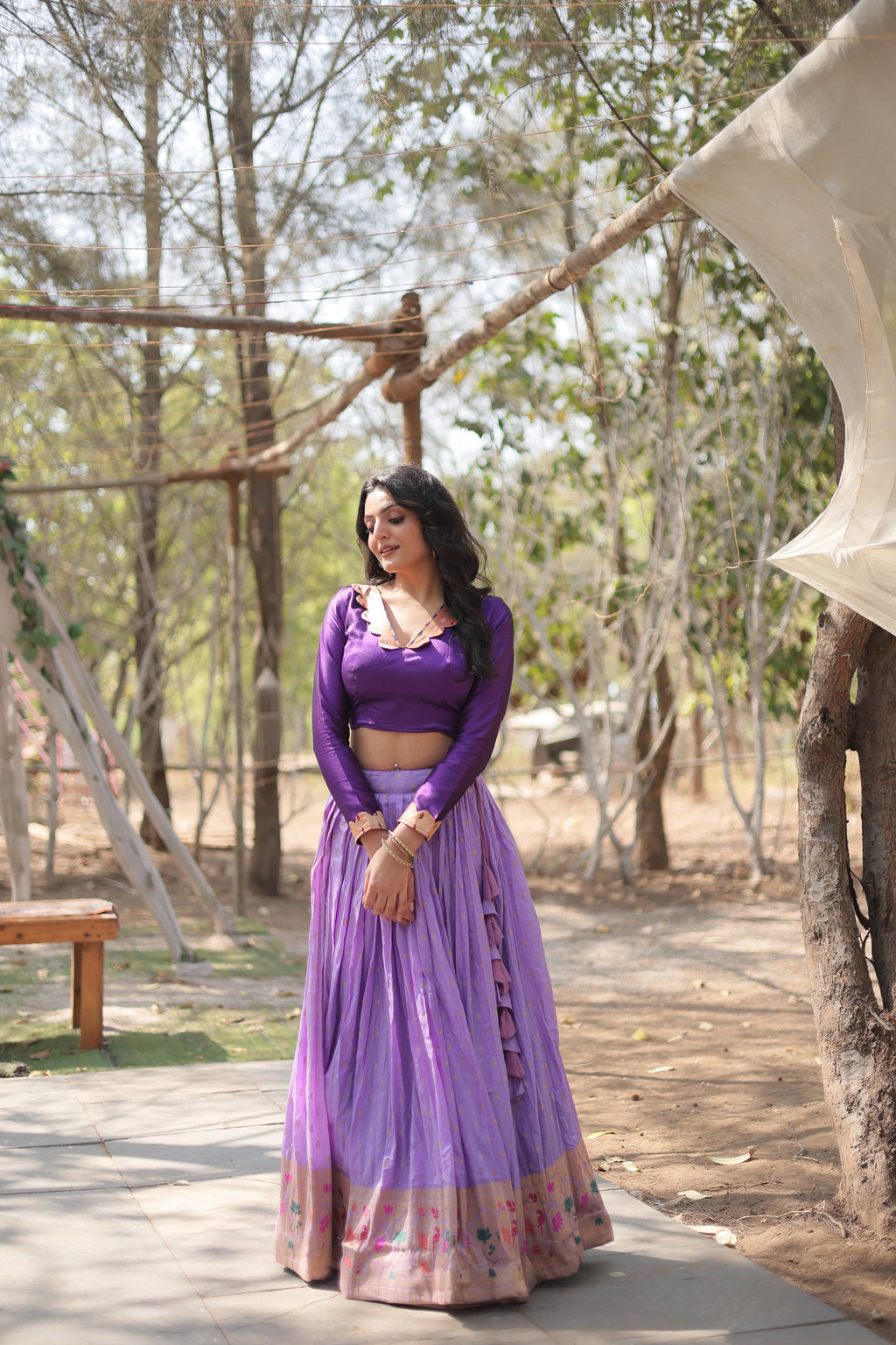 Purple Paithani Lehenga Choli with rich silk fabric, traditional zari work, and intricate motifs.