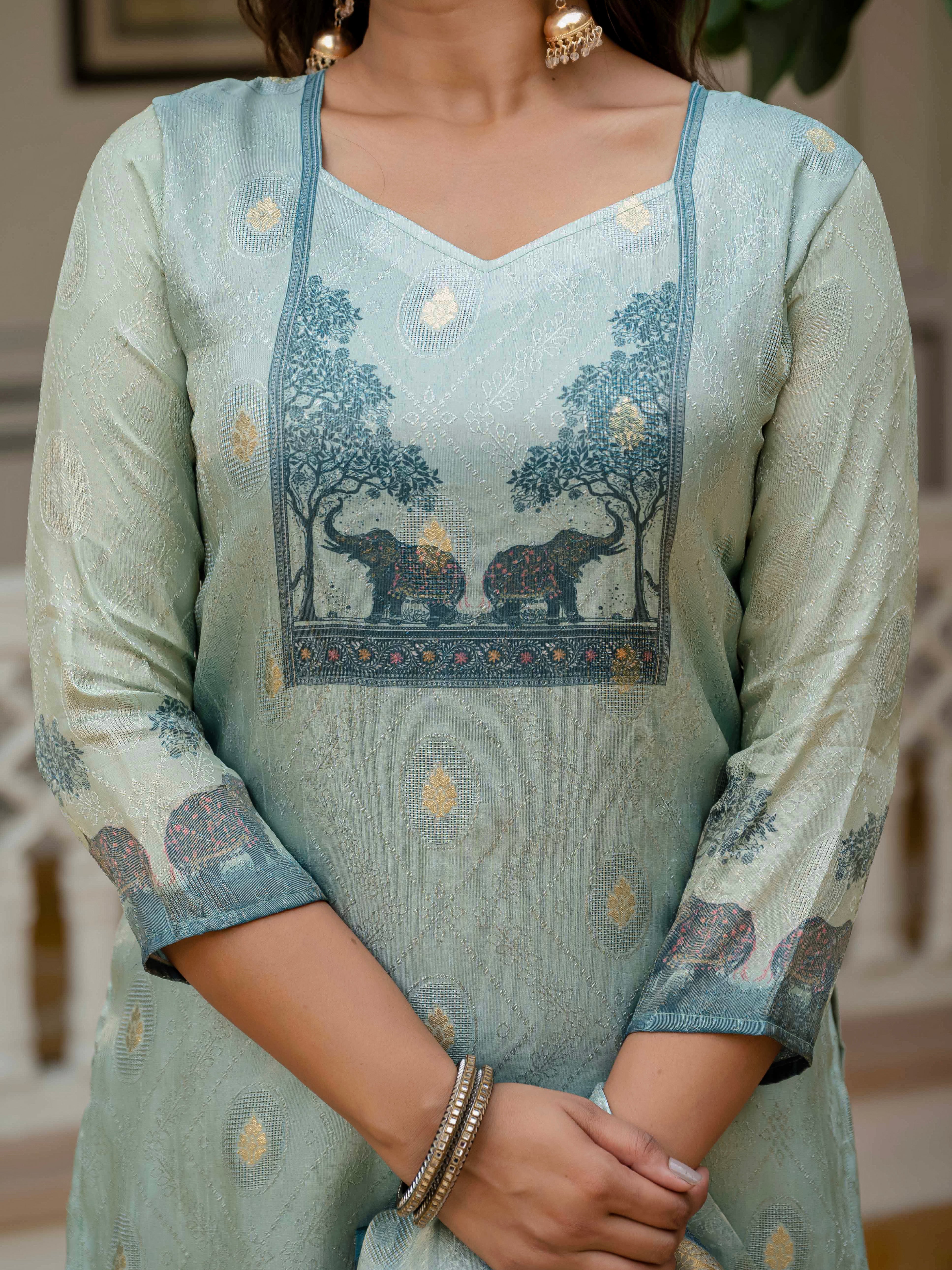 Close-up of the Royal Blue jacquard silk kurti with V-neck and intricate elephant & tree print.