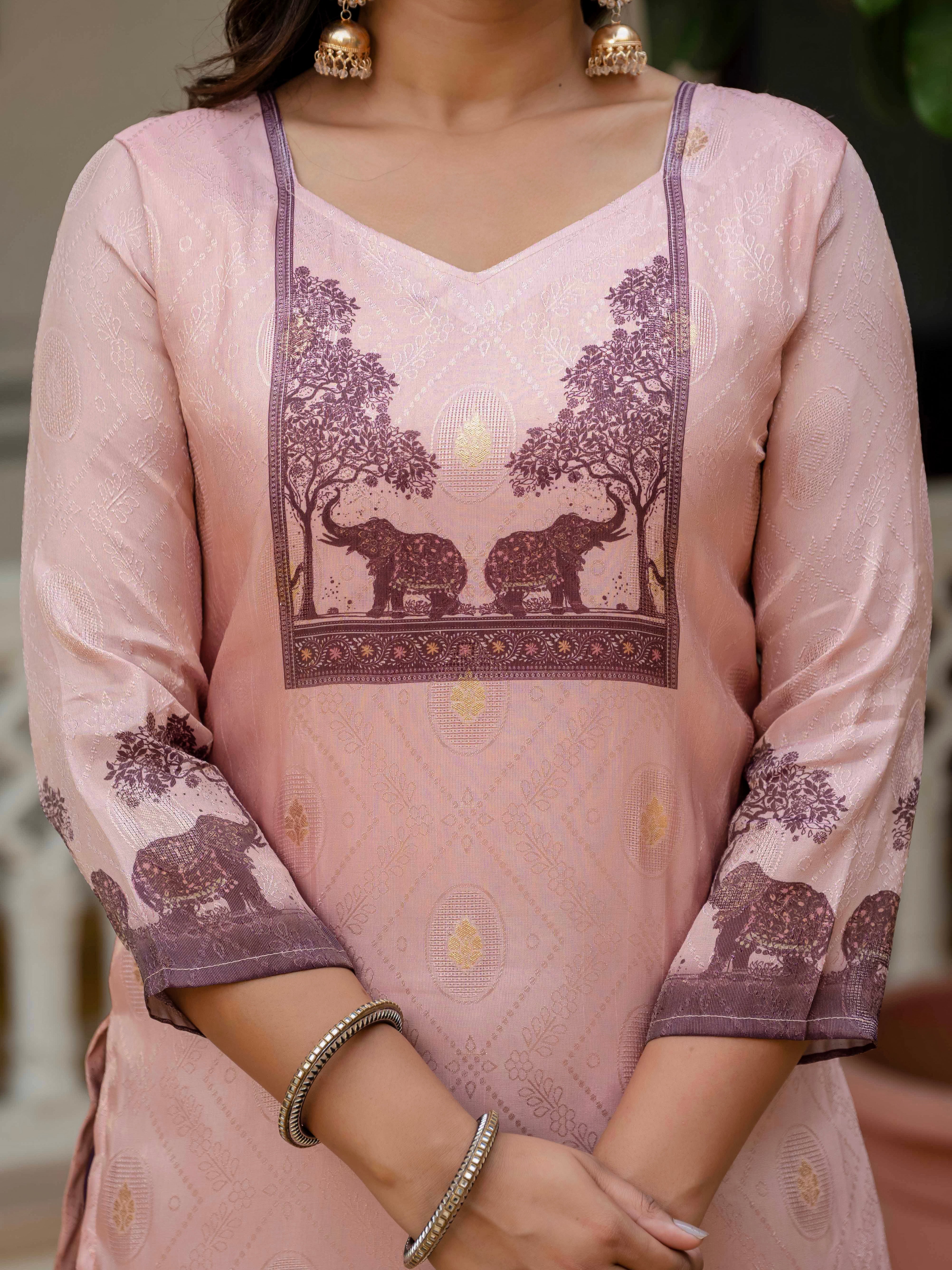 Close-up of the Royal Pink jacquard silk kurti with V-neck and intricate elephant & tree print.