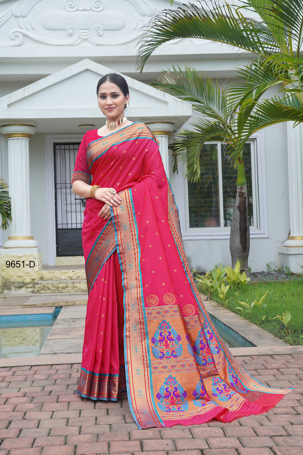 Red classical design Paithani saree featuring intricate traditional motifs.