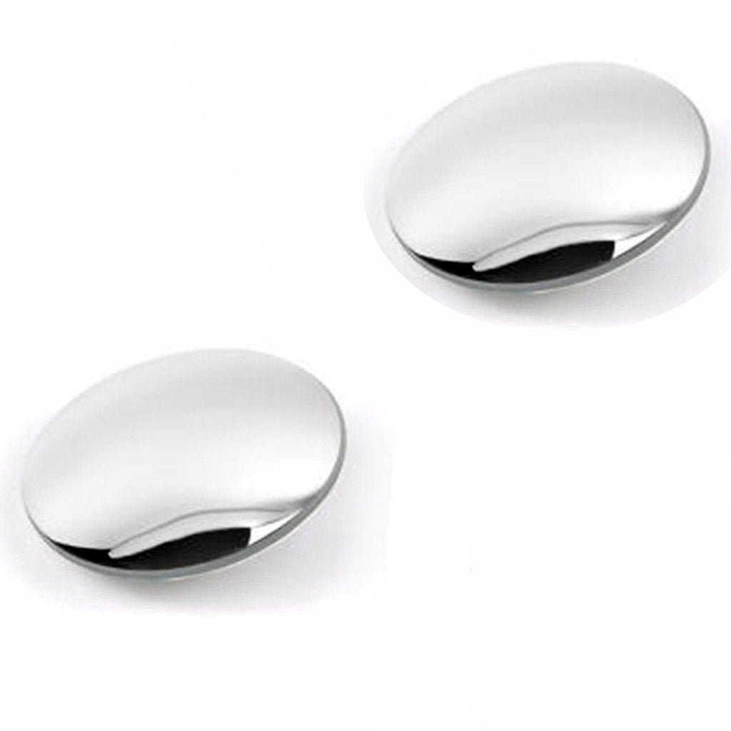 Two round wide-angle adjustable convex blind spot mirrors, one installed on a car's side mirror.