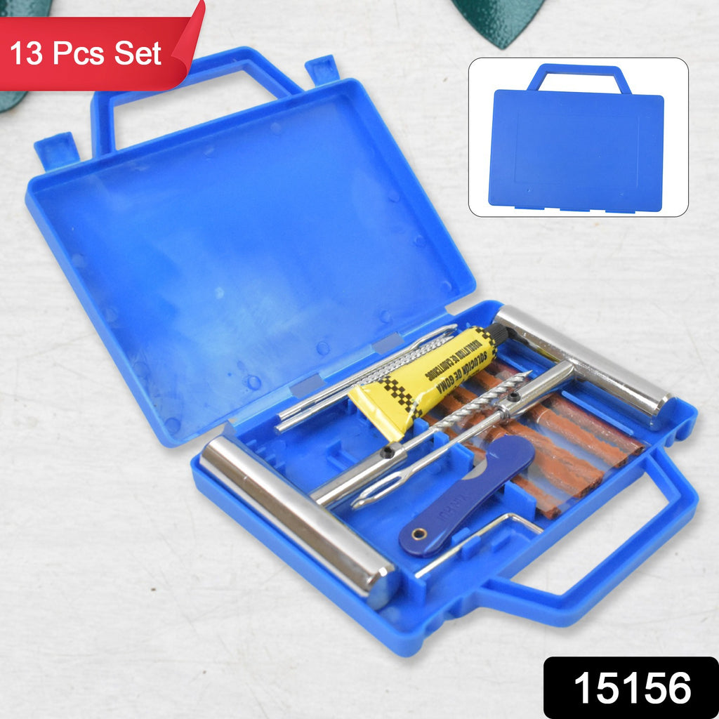 Portable 13-piece tire repair kit tool set with reamers, plugs, and insertion tools organized in a black box.