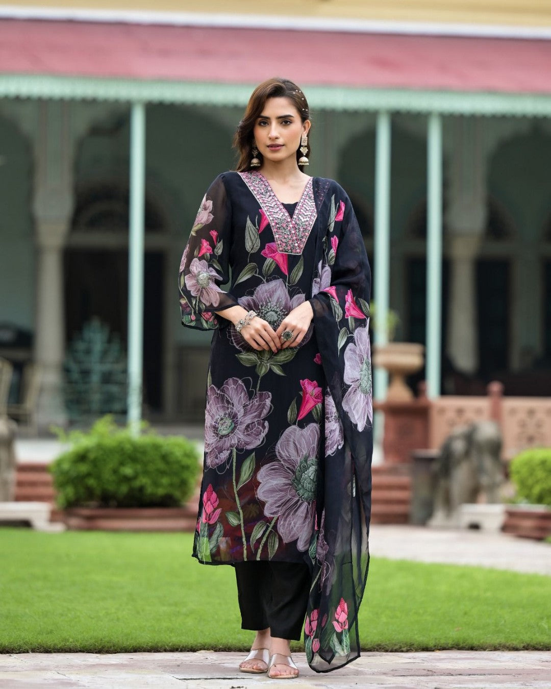 Full length view of model confidently wearing the TRENDBUY Sonika black Georgette floral kurta set.