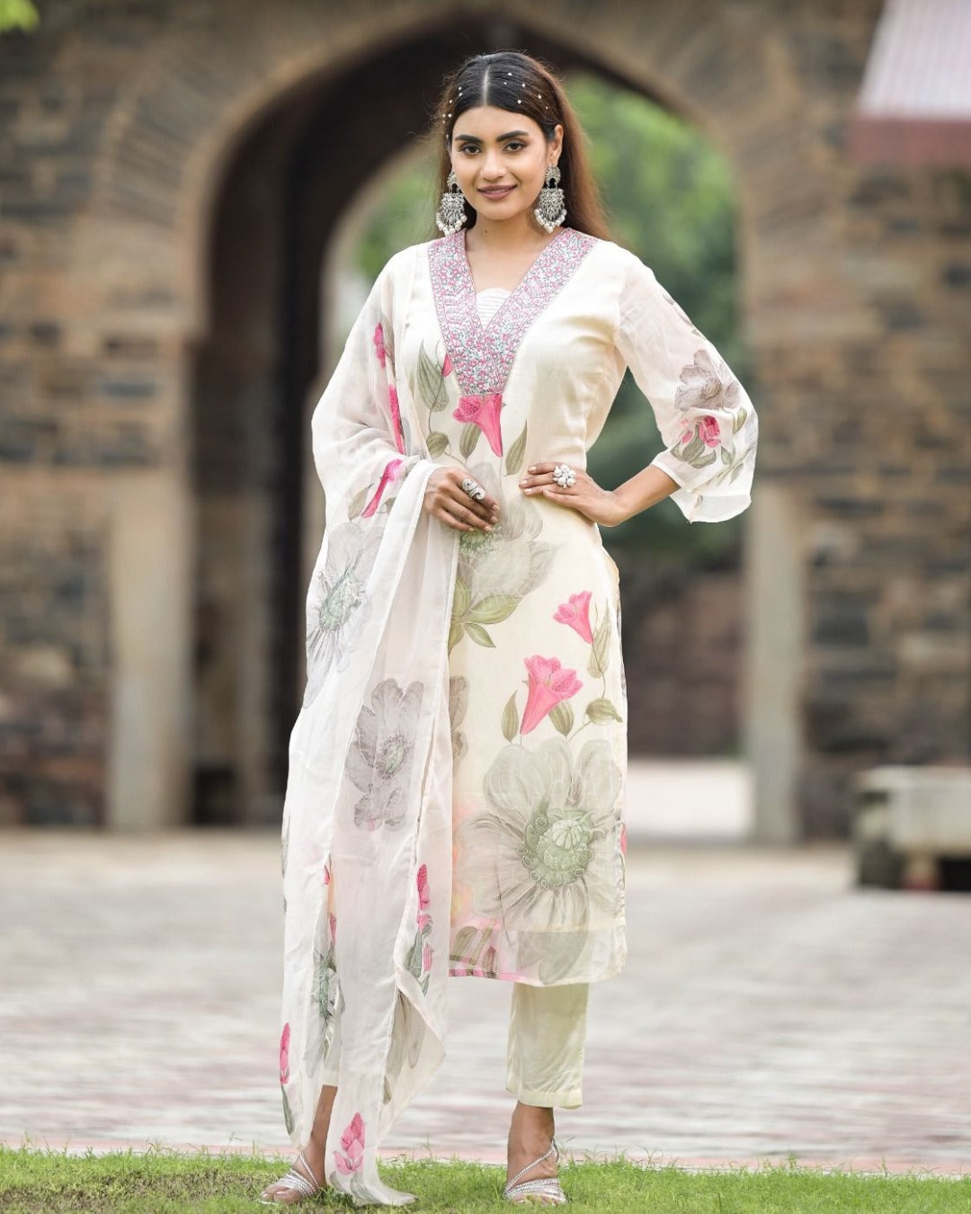 Full length view of model in white floral Georgette kurta set by TRENDBUY, showcasing elegant drape.