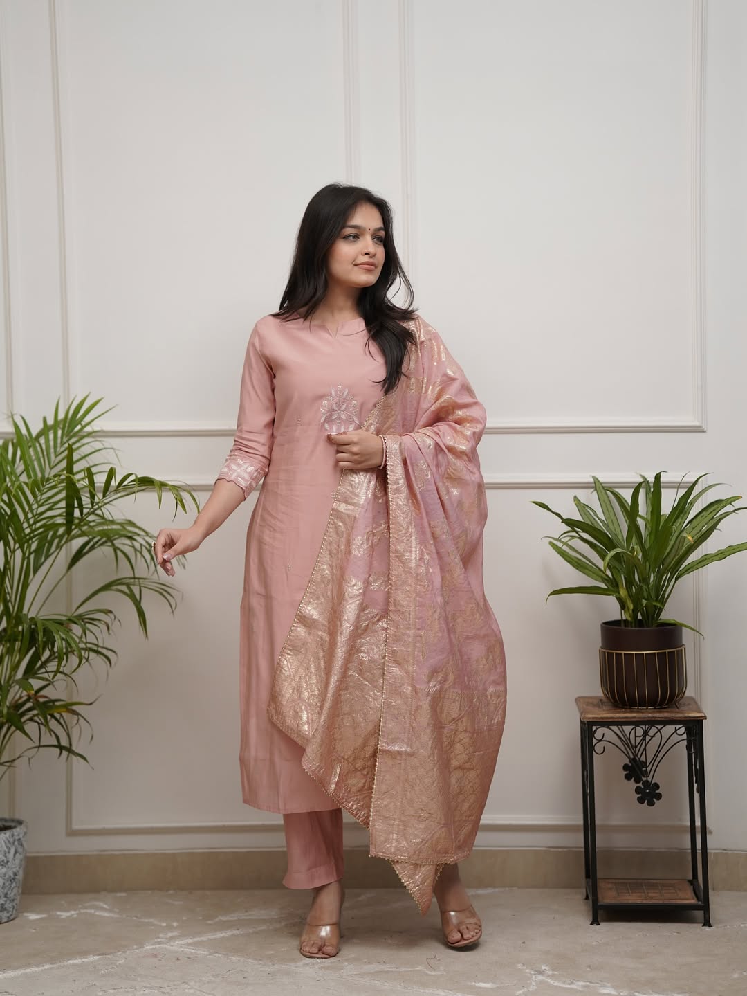 Model wearing TRENDBUY ST-SWATI peach PV Chanderi kurti set, standing confidently, showcasing the full outfit including kurti, pant, and cotton jacquard dupatta.