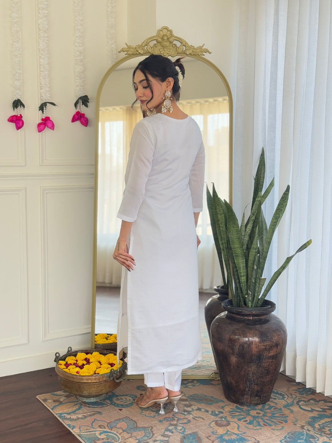 Back view of the white Viscose Chanderi kurta set, highlighting the simple yet sophisticated design and fit.