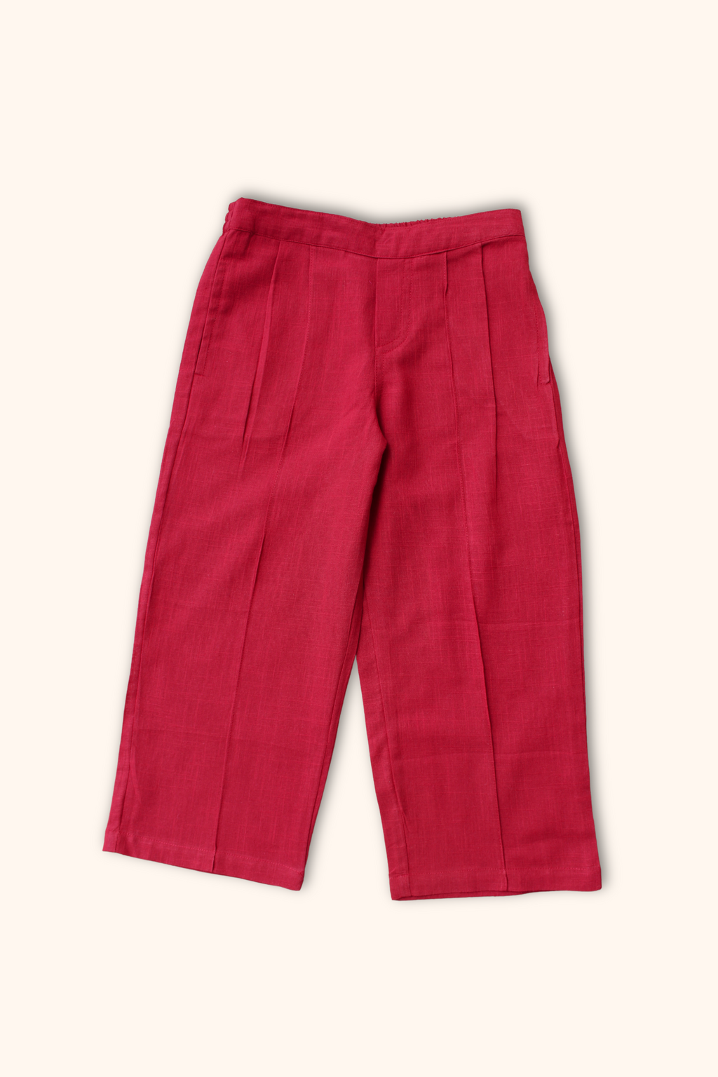 Girls' 100% cotton pleated pants, featuring soft fabric and elegant pleats.