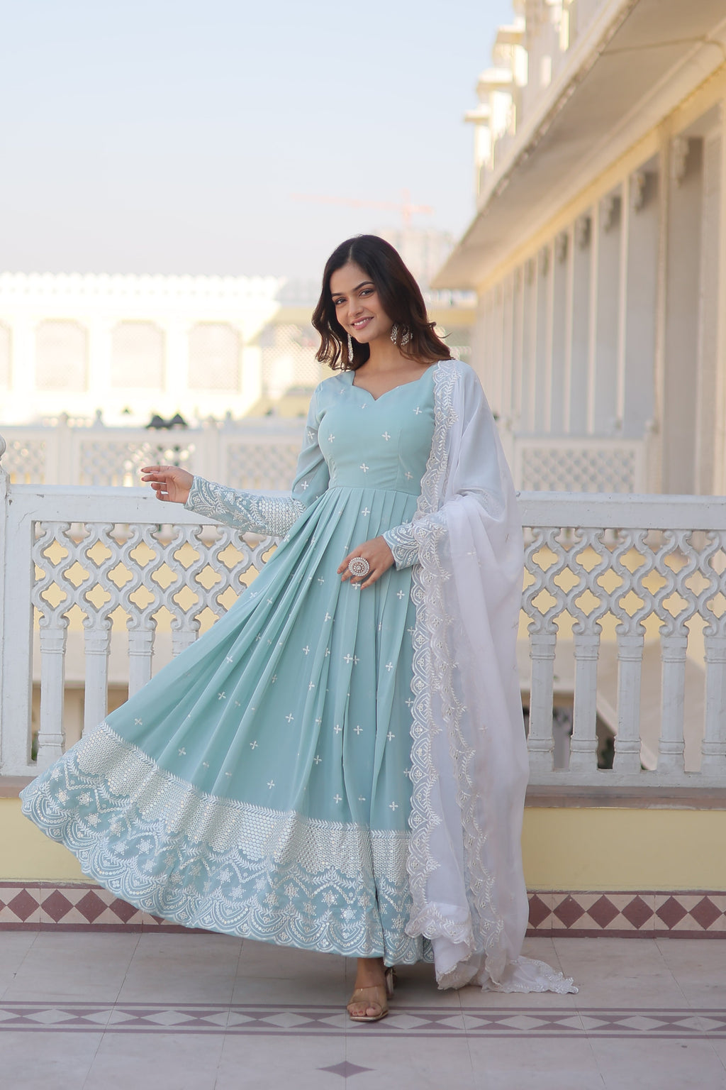 Sky color fancy V-neck designer gown