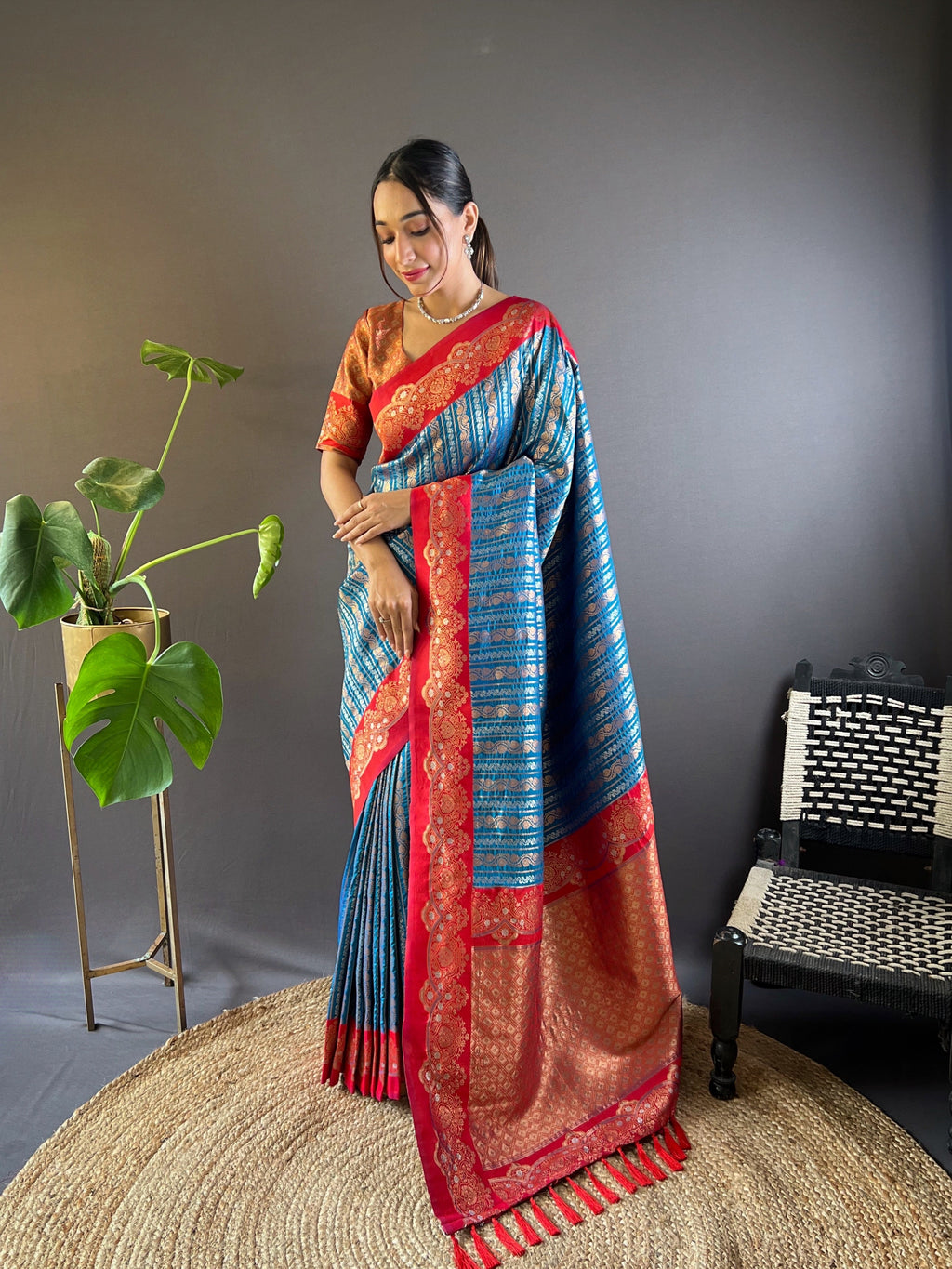 Elegant teal soft silk zari woven partywear saree with gold zari border