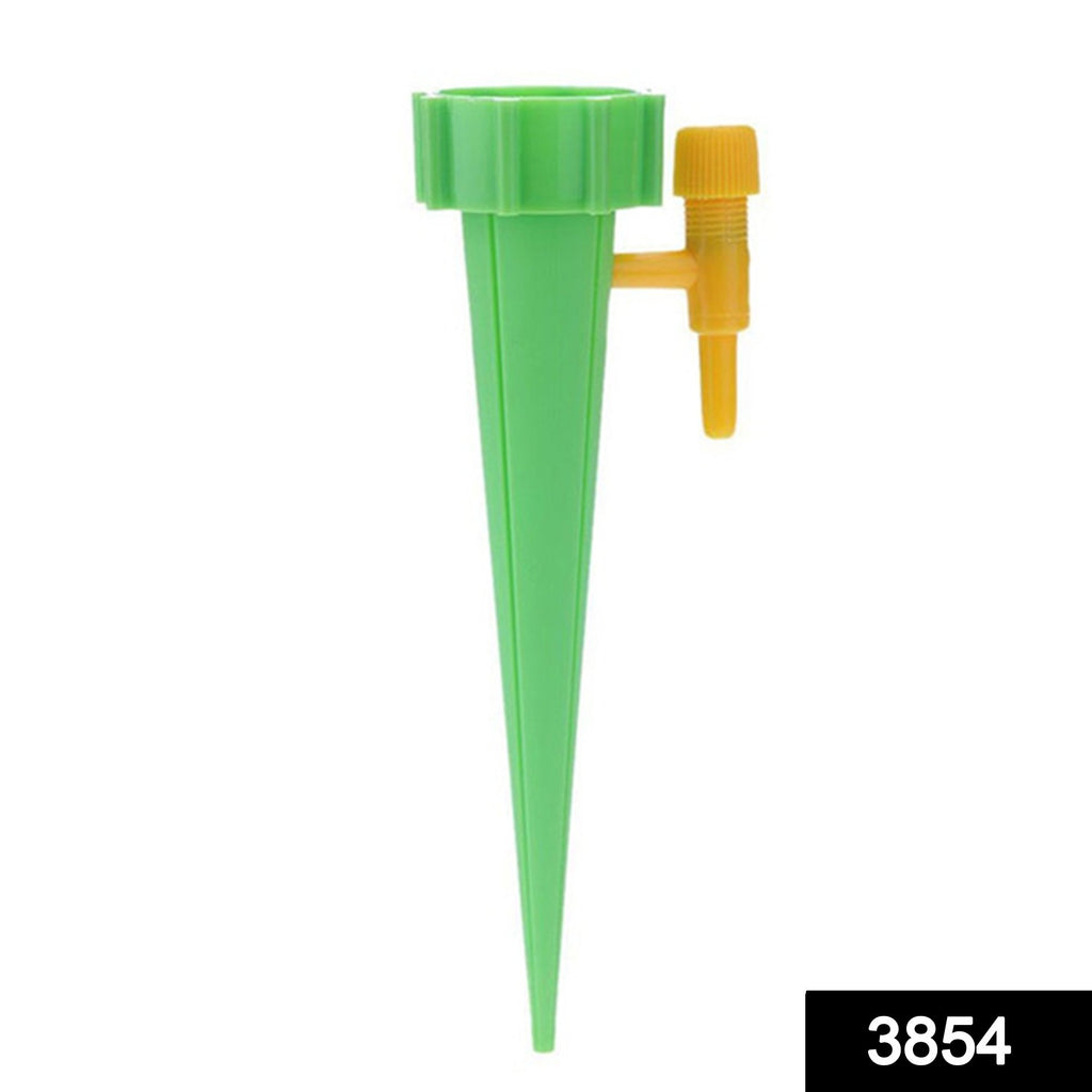 Drip irrigation self-watering spike in a plant pot for home garden plants