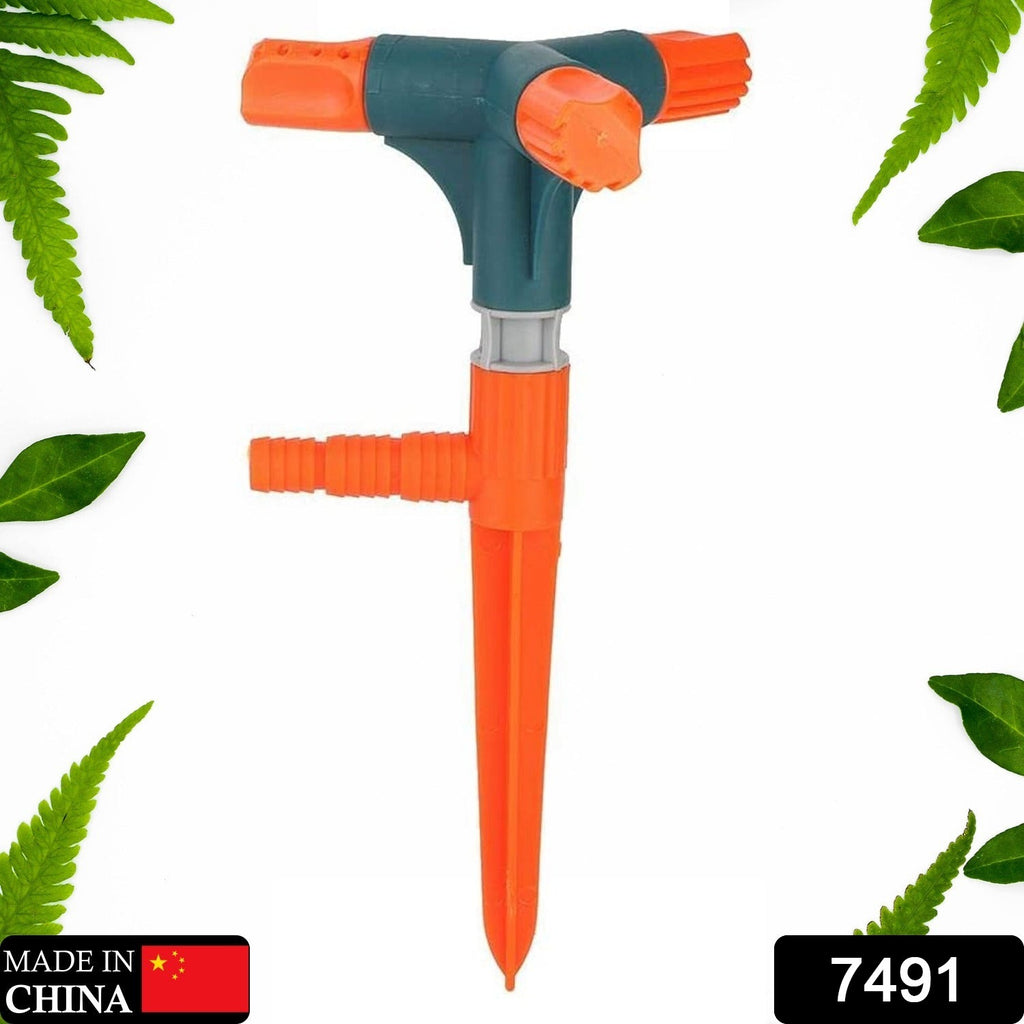 360 rotating adjustable 3-arm lawn sprinkler watering a garden