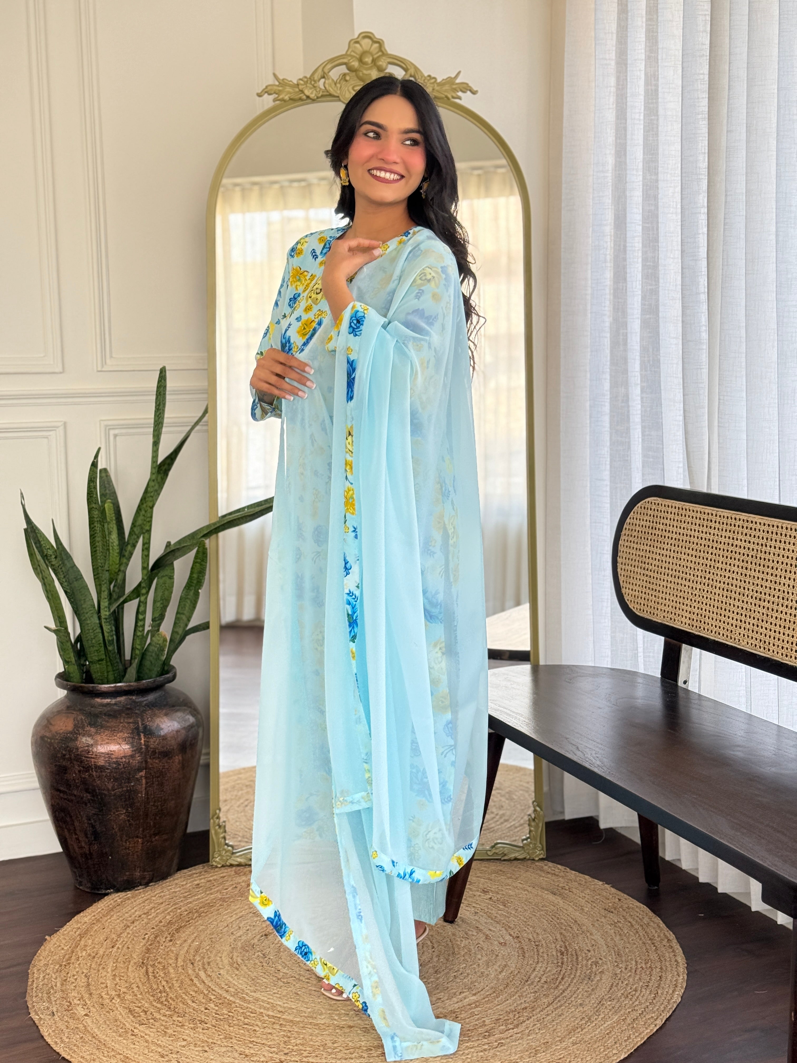 Smiling model showcasing the full drape and style of the TRENDBUY floral printed kurta and dupatta.