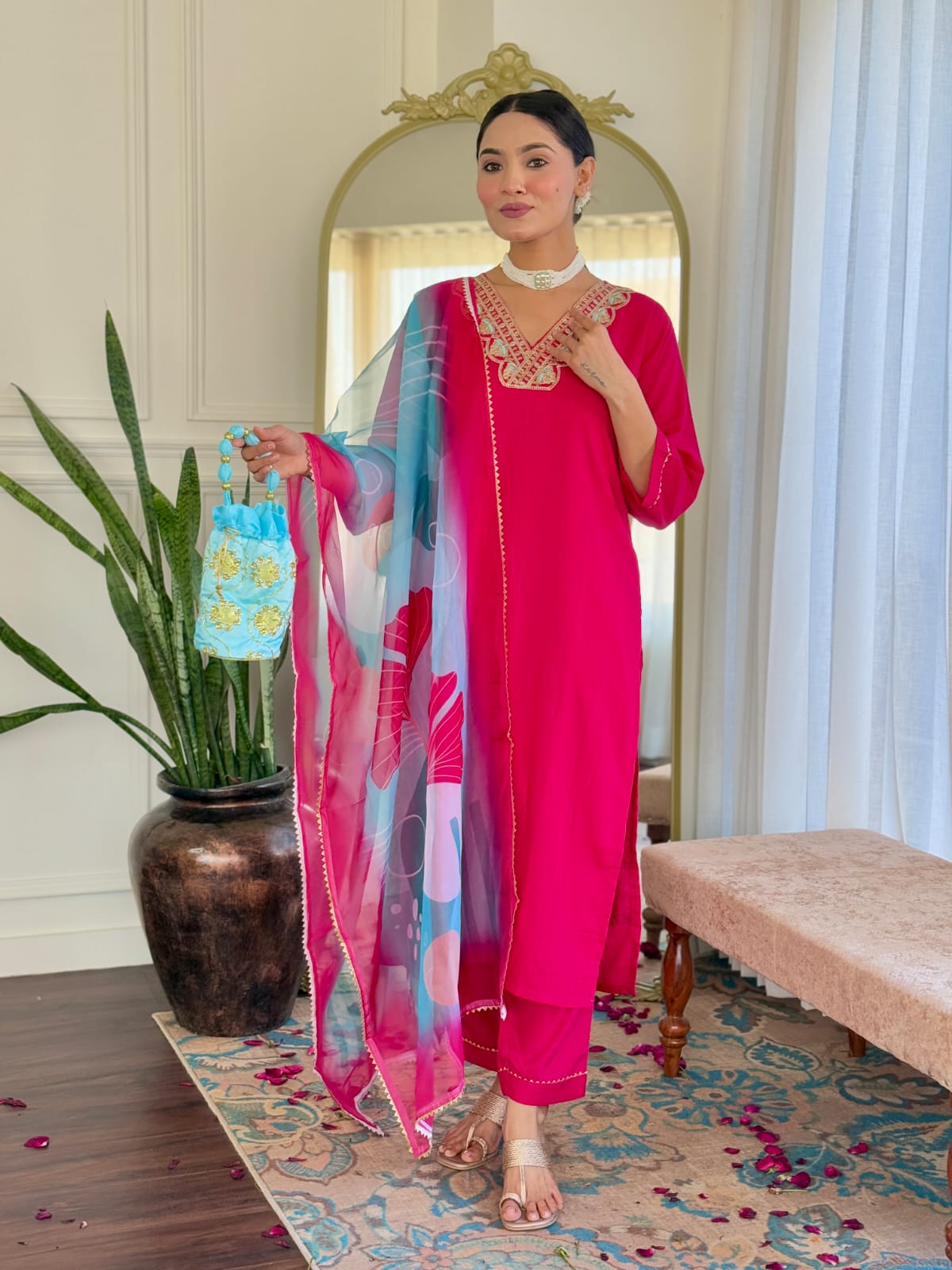 Full length view of the hot pink rayon kurti, pant, and dupatta set, emphasizing the elegant fit and embroidery detail.