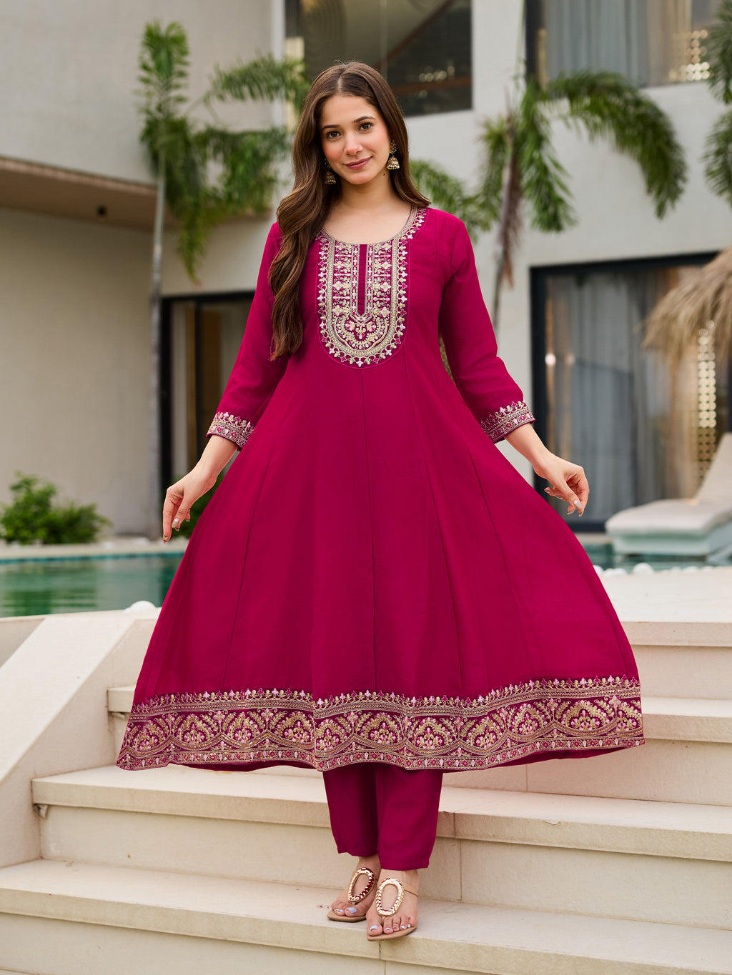 TRENDBUY VI-SHAKTI Rani Pink embroidered A-line kurti with pant, model standing on white steps.