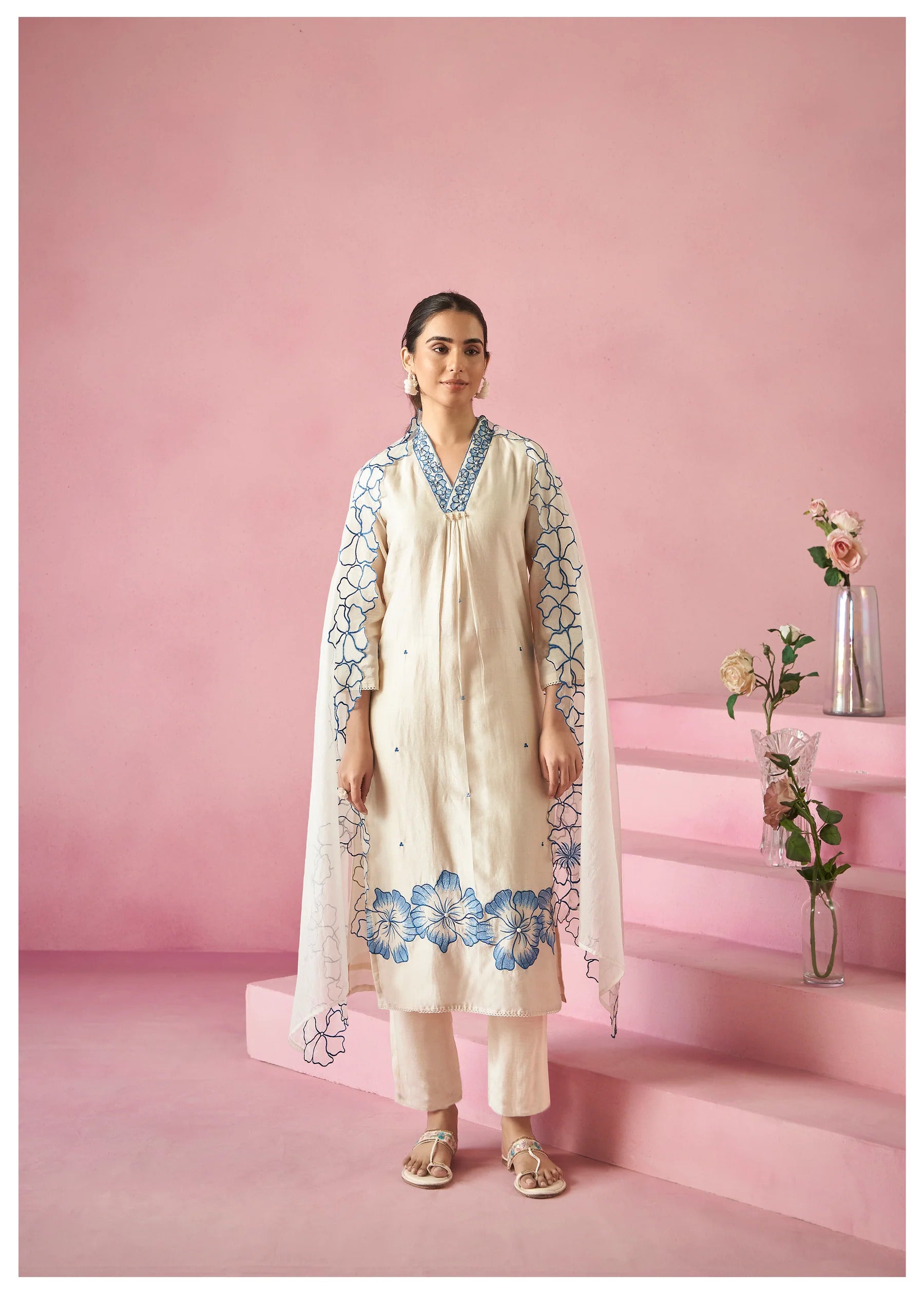 Front view of TRENDBUY model wearing the elegant white kurti with blue embroidery and matching pant, featuring the sheer pure organza dupatta.