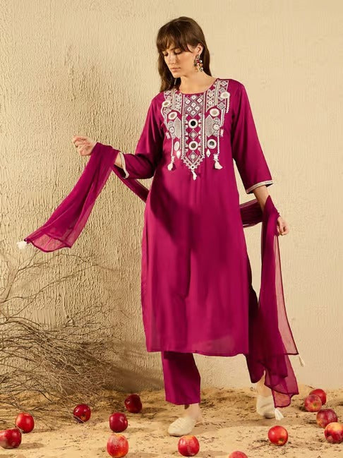 TRENDBUY model in pink embroidered Viscose Chanderi Kurti Pant set with Organza dupatta, holding the dupatta gracefully