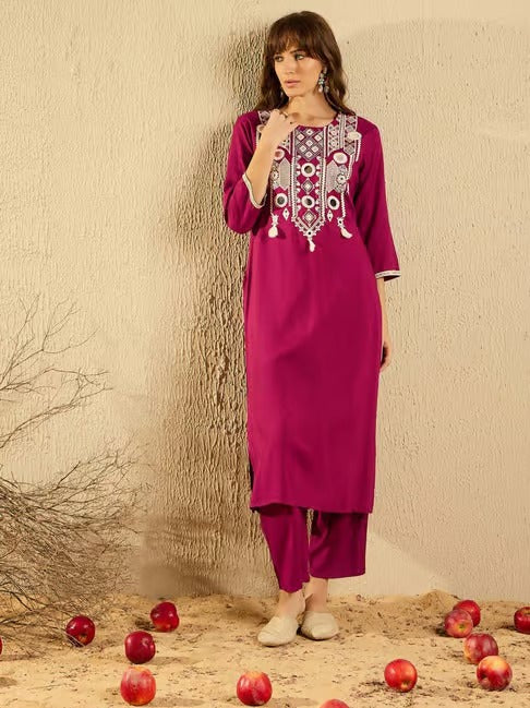 TRENDBUY model posing elegantly in a pink embroidered Viscose Chanderi Kurti Pant set