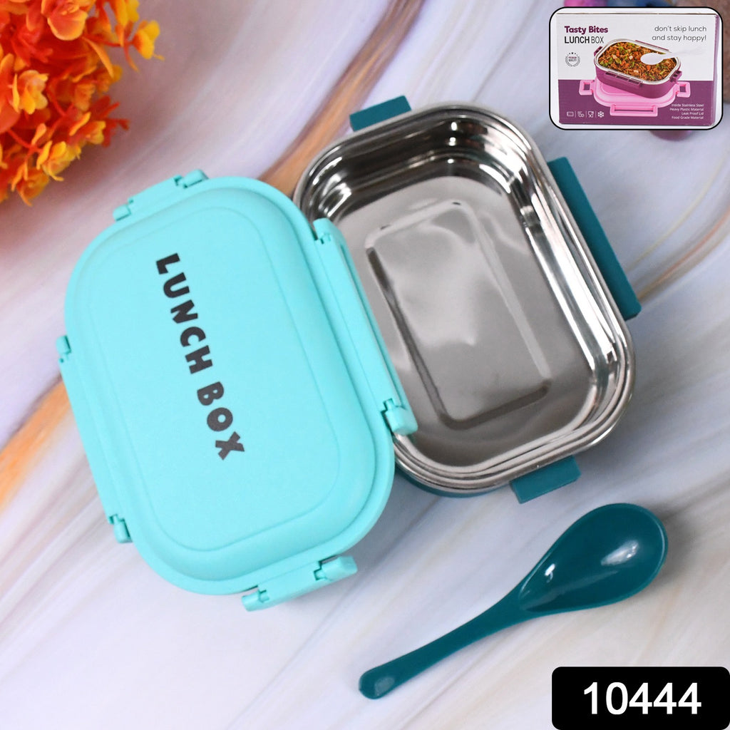 Insulated stainless steel leakproof lunch box open, showing food in compartments with spoon