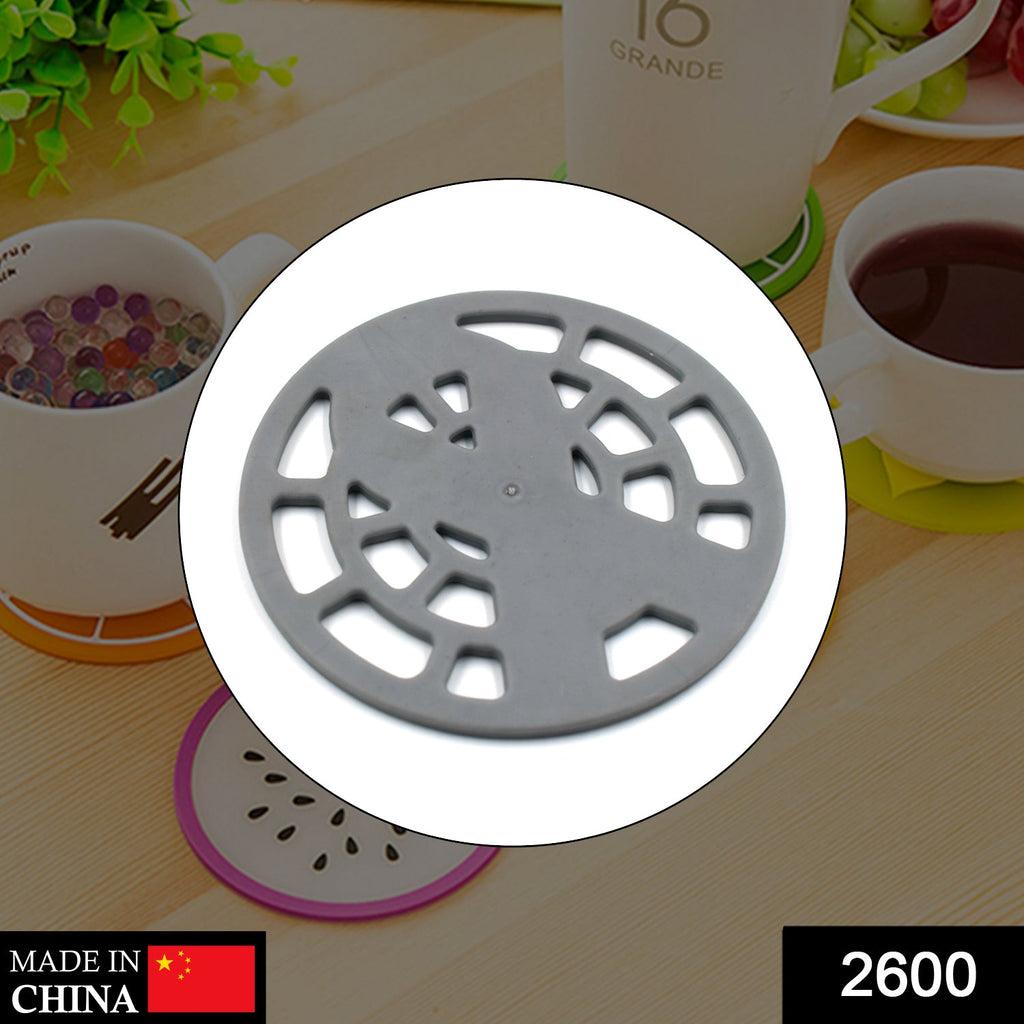 Hexagonal silicone honeycomb coaster for bowls & utensils, heat-resistant for all kitchen purposes.