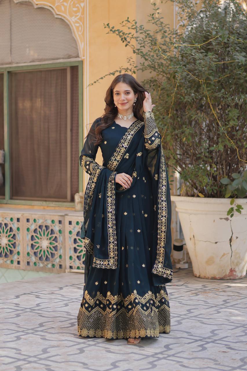 Elegant readymade wedding gown featuring intricate embroidery and a matching dupatta.