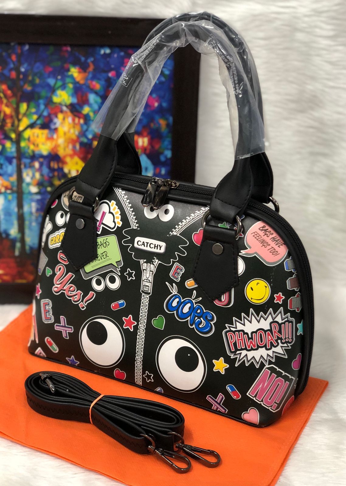 Shop the Eye Theme Printed Leather Sling Handbag - Stylish and Functional Black