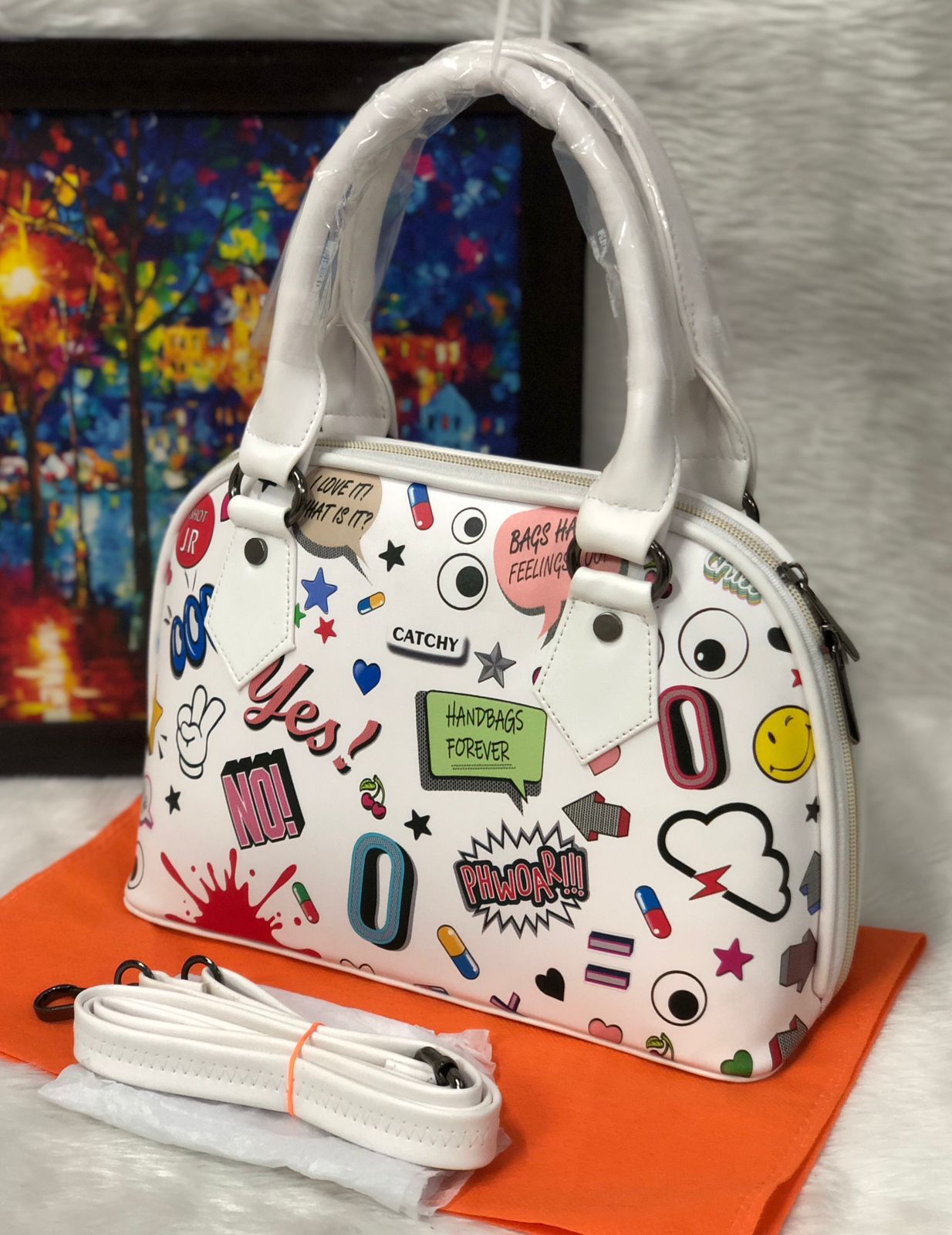 Shop the Eye Theme Printed Leather Sling Handbag - Stylish and Functional