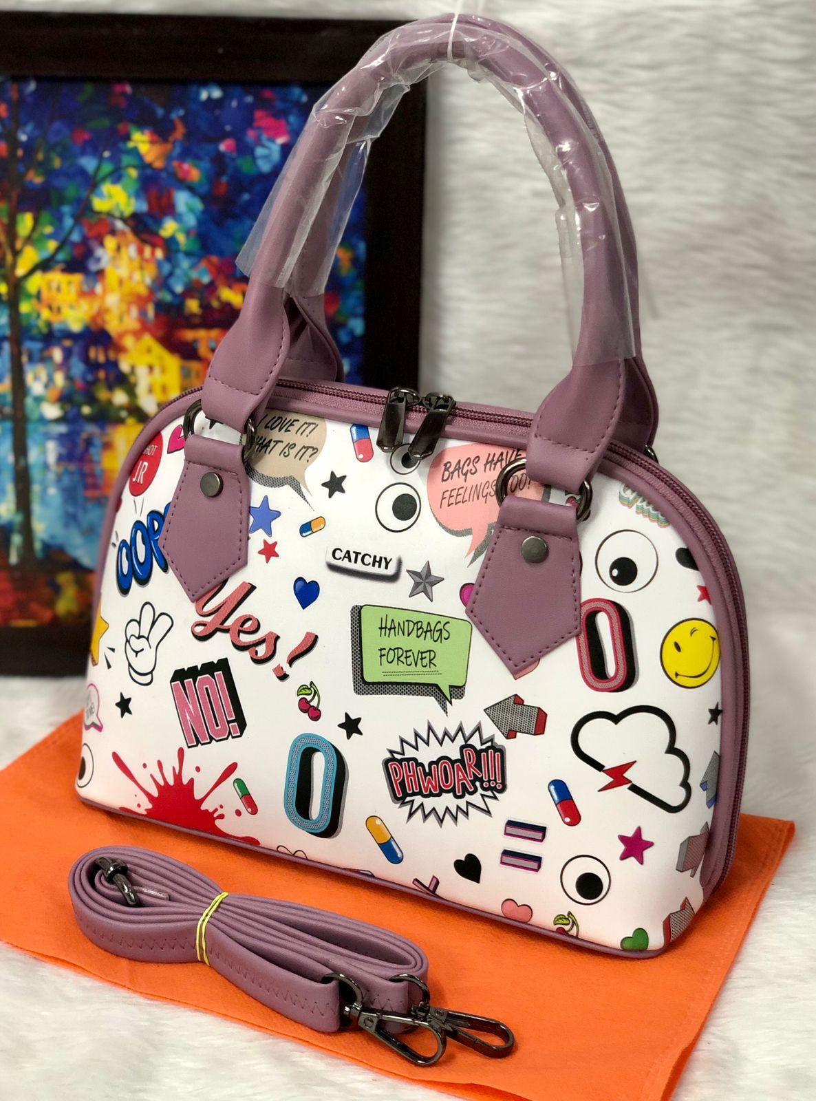 Shop the Eye Theme Printed Leather Sling Handbag - Stylish and Functional pink