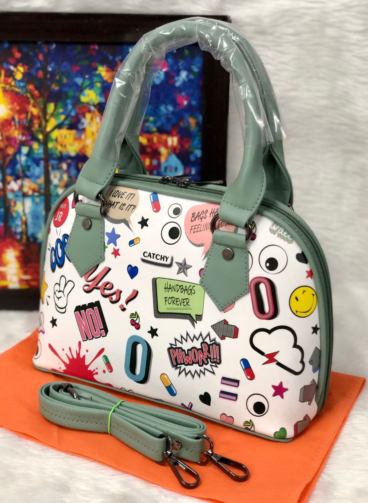 Shop the Eye Theme Printed Leather Sling Handbag - Stylish and Functional