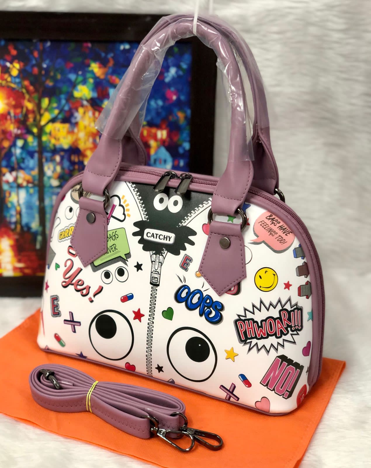 Shop the Eye Theme Printed Leather Sling Handbag - Stylish and Functional
