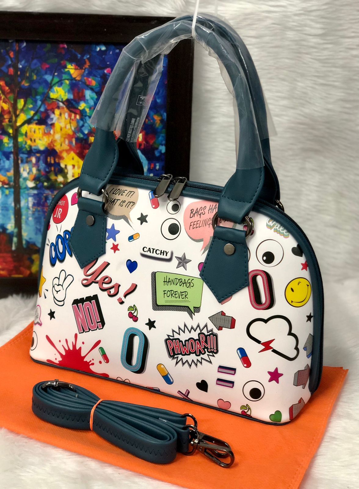 Shop the Eye Theme Printed Leather Sling Handbag - Stylish and Functional