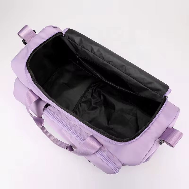 Purple Duffel bag with open lid on a white background