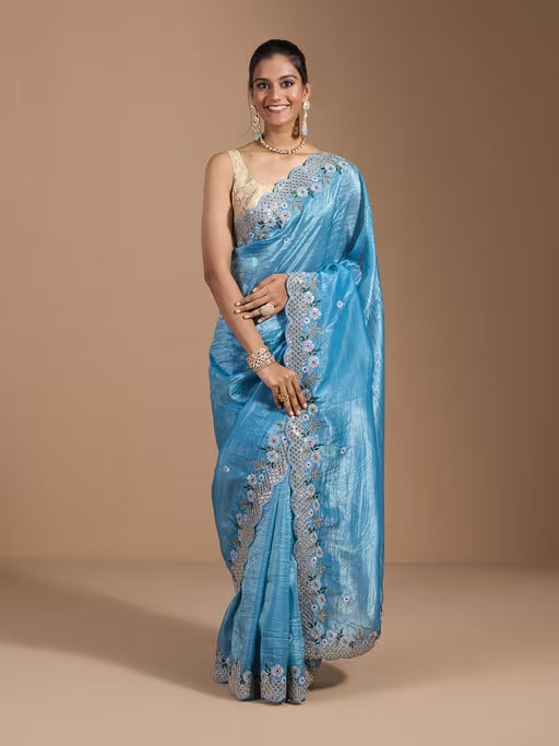 Ocean blue wedding gold crush saree featuring shimmering gold details