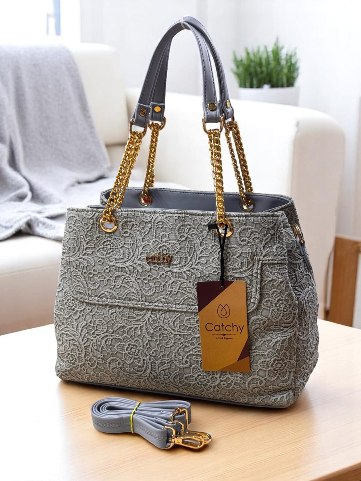 TRENDBUY Light Grey lace pattern handbag with stylish gold chain straps and an adjustable crossbody strap, ready for daily wear.