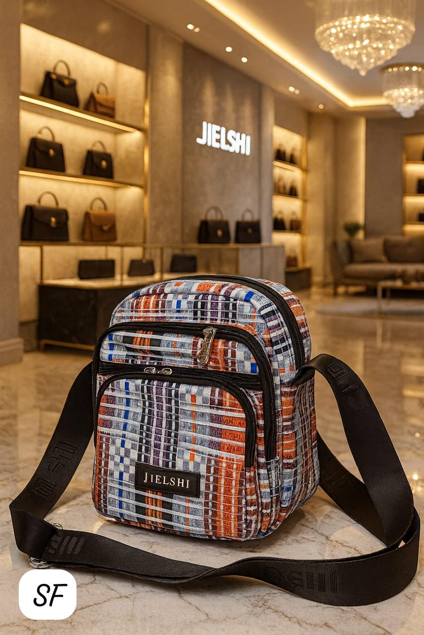 TRENDBUY Jielshi multi-compartment sling bag featuring a vibrant plaid pattern, showcased on a marble table.