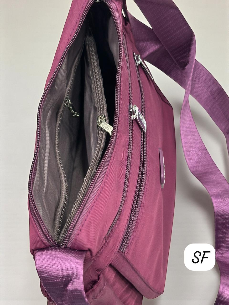 Close-up interior view of TRENDBUY's imported purple sling bag showcasing multiple zippered compartments and quality lining
