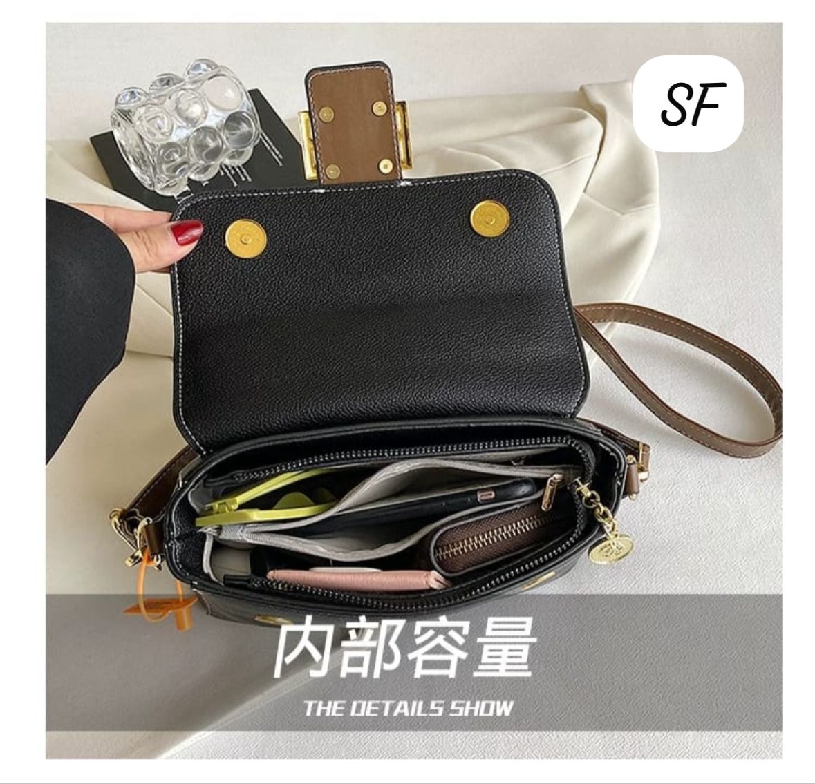 Interior view of TRENDBUY black sling bag showing organized compartments and pockets