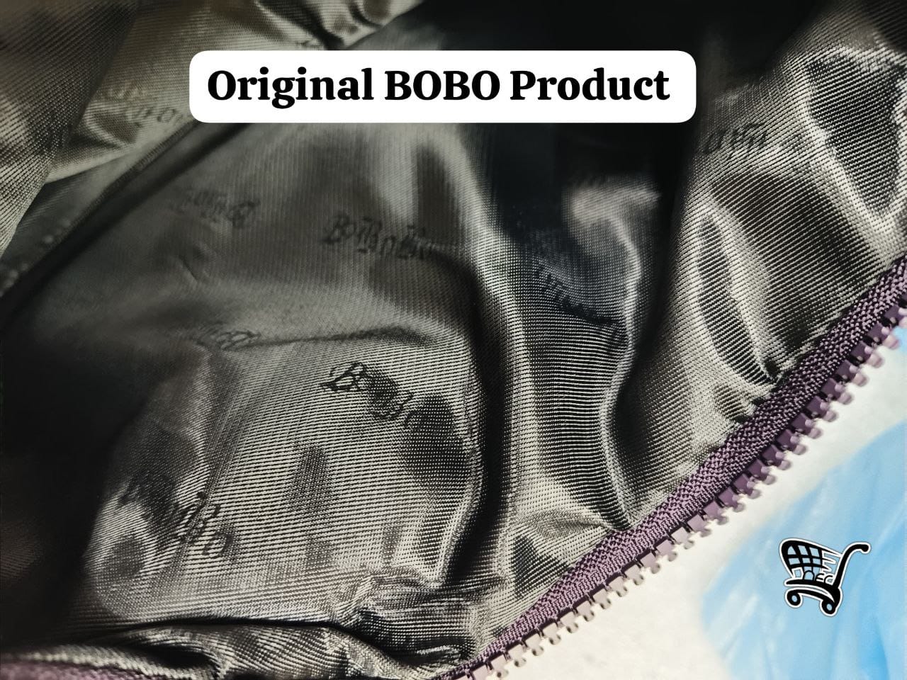 Close-up interior view of TRENDBUY BOBO Original purple nylon bag with embossed logo and zipper