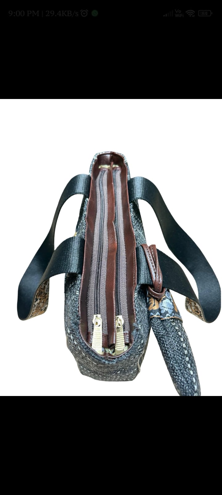 Overhead view of the TRENDBUY Pum Pum Tote Bag's interior, showing dual zippered compartments and secure main storage.