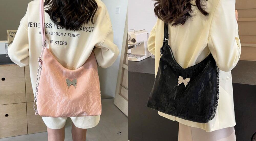 Models displaying the pink and black versions of the butterfly accent 2-in-1 bag, highlighting its tote/shoulder bag functionality.